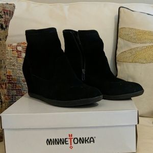 Black suede Minnetonka side zip wedge booties